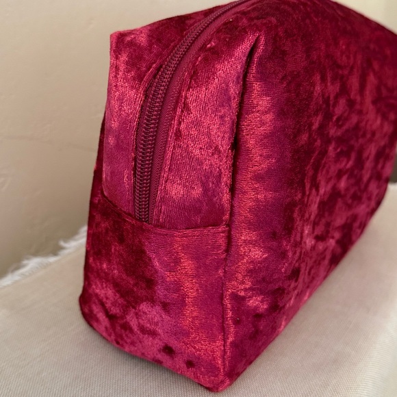 Beautiful cranberry red crushed velvet bag with hair, skin and make-up products - Picture 7 of 7